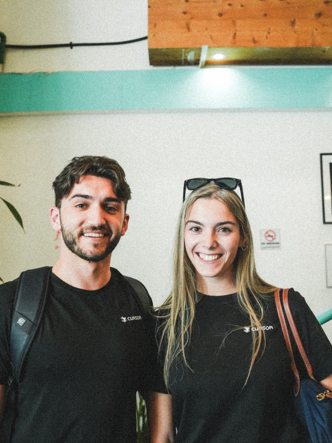 Cafe Cursor Dubai hosts wearing Cursor shirts